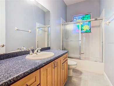 Immaculate & Well Maintained RHAPSODY model on a serene on Poinciana Golf Club in Florida - for sale on GolfHomes.com, golf home, golf lot