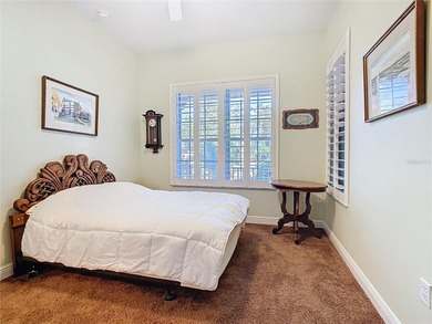 Immaculate & Well Maintained RHAPSODY model on a serene on Poinciana Golf Club in Florida - for sale on GolfHomes.com, golf home, golf lot