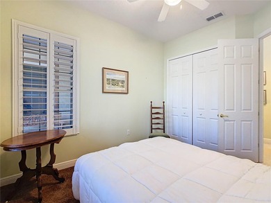 Immaculate & Well Maintained RHAPSODY model on a serene on Poinciana Golf Club in Florida - for sale on GolfHomes.com, golf home, golf lot