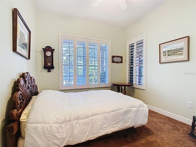 Immaculate & Well Maintained RHAPSODY model on a serene on Poinciana Golf Club in Florida - for sale on GolfHomes.com, golf home, golf lot