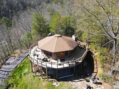 Circular 2 story cabin with 3bed, 3 baths and 1380sqft. Nestled on Bent Creek Golf Course in Tennessee - for sale on GolfHomes.com, golf home, golf lot