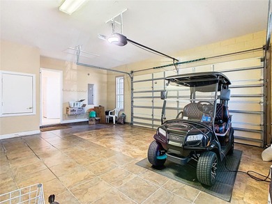 Immaculate & Well Maintained RHAPSODY model on a serene on Poinciana Golf Club in Florida - for sale on GolfHomes.com, golf home, golf lot