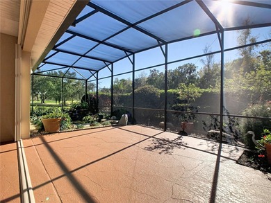 Immaculate & Well Maintained RHAPSODY model on a serene on Poinciana Golf Club in Florida - for sale on GolfHomes.com, golf home, golf lot