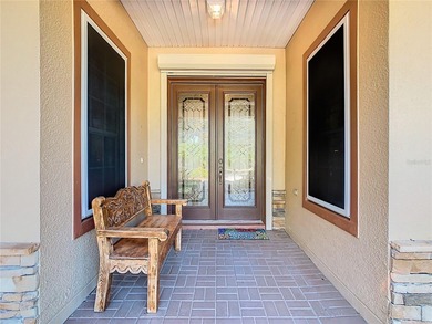 Immaculate & Well Maintained RHAPSODY model on a serene on Poinciana Golf Club in Florida - for sale on GolfHomes.com, golf home, golf lot