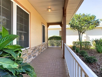 Immaculate & Well Maintained RHAPSODY model on a serene on Poinciana Golf Club in Florida - for sale on GolfHomes.com, golf home, golf lot