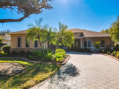 Immaculate & Well Maintained RHAPSODY model on a serene on Poinciana Golf Club in Florida - for sale on GolfHomes.com, golf home, golf lot