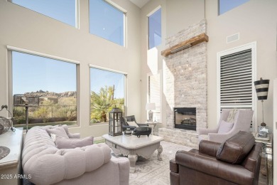 Experience the blend of modern design and timeless elegance in on Troon North Golf Club  in Arizona - for sale on GolfHomes.com, golf home, golf lot