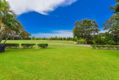 Located in the very active Eaglewood Golf and Tennis Community on Eagle Wood Golf Course in Florida - for sale on GolfHomes.com, golf home, golf lot
