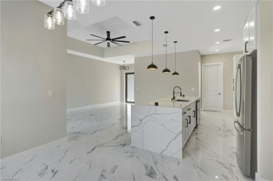 Your Dream Home Is Ready! Welcome to luxury coastal living in on Rotonda Golf and Country Club The Palms Course in Florida - for sale on GolfHomes.com, golf home, golf lot