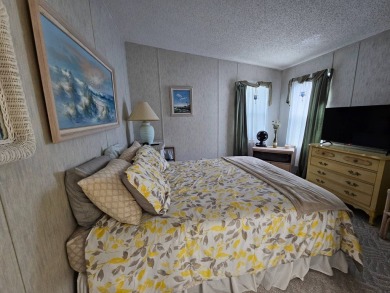 This home is on leased land, buyers do not own the land. This on Big Cypress Golf and Country Club in Florida - for sale on GolfHomes.com, golf home, golf lot