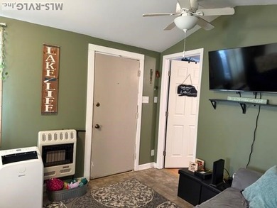 So much here for a great price! A living room and a bedroom are on River Ridge Golf Club in Virginia - for sale on GolfHomes.com, golf home, golf lot