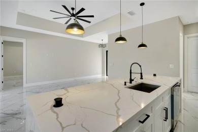 Your Dream Home Is Ready! Welcome to luxury coastal living in on Rotonda Golf and Country Club The Palms Course in Florida - for sale on GolfHomes.com, golf home, golf lot