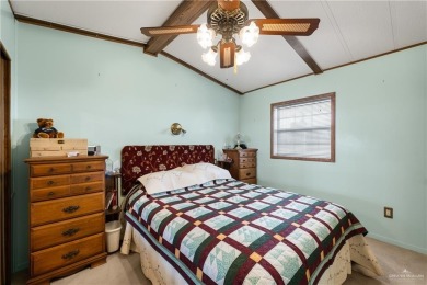 This 2-bedroom, 1.5-bath manufactured home is nestled in a on Howling Trails Golf  in Texas - for sale on GolfHomes.com, golf home, golf lot