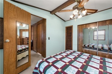 This 2-bedroom, 1.5-bath manufactured home is nestled in a on Howling Trails Golf  in Texas - for sale on GolfHomes.com, golf home, golf lot