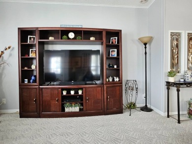 This home is on leased land, buyers do not own the land. This on Big Cypress Golf and Country Club in Florida - for sale on GolfHomes.com, golf home, golf lot