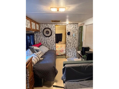 So much here for a great price! A living room and a bedroom are on River Ridge Golf Club in Virginia - for sale on GolfHomes.com, golf home, golf lot