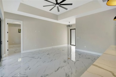 Your Dream Home Is Ready! Welcome to luxury coastal living in on Rotonda Golf and Country Club The Palms Course in Florida - for sale on GolfHomes.com, golf home, golf lot