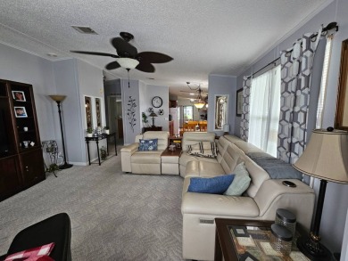 This home is on leased land, buyers do not own the land. This on Big Cypress Golf and Country Club in Florida - for sale on GolfHomes.com, golf home, golf lot