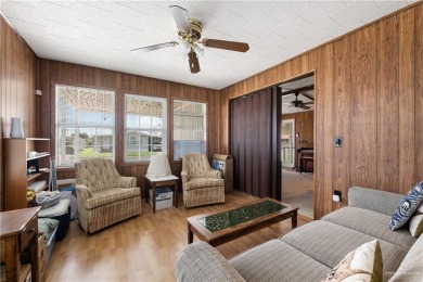 This 2-bedroom, 1.5-bath manufactured home is nestled in a on Howling Trails Golf  in Texas - for sale on GolfHomes.com, golf home, golf lot