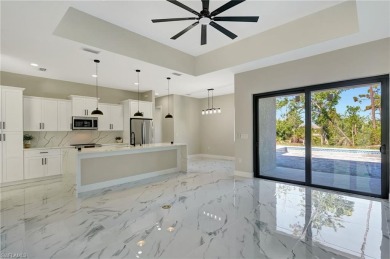 Your Dream Home Is Ready! Welcome to luxury coastal living in on Rotonda Golf and Country Club The Palms Course in Florida - for sale on GolfHomes.com, golf home, golf lot
