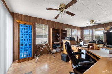 This 2-bedroom, 1.5-bath manufactured home is nestled in a on Howling Trails Golf  in Texas - for sale on GolfHomes.com, golf home, golf lot