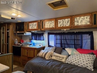 So much here for a great price! A living room and a bedroom are on River Ridge Golf Club in Virginia - for sale on GolfHomes.com, golf home, golf lot