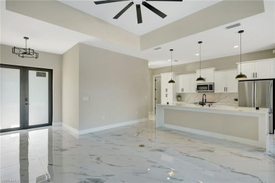 Your Dream Home Is Ready! Welcome to luxury coastal living in on Rotonda Golf and Country Club The Palms Course in Florida - for sale on GolfHomes.com, golf home, golf lot