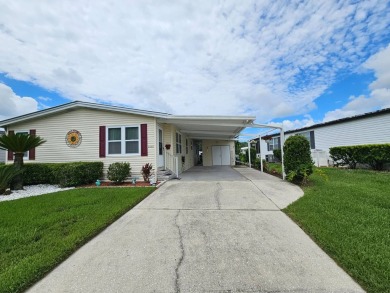 This home is on leased land, buyers do not own the land. This on Big Cypress Golf and Country Club in Florida - for sale on GolfHomes.com, golf home, golf lot