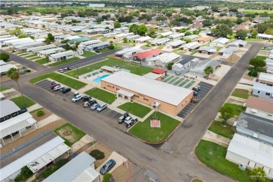 This 2-bedroom, 1.5-bath manufactured home is nestled in a on Howling Trails Golf  in Texas - for sale on GolfHomes.com, golf home, golf lot