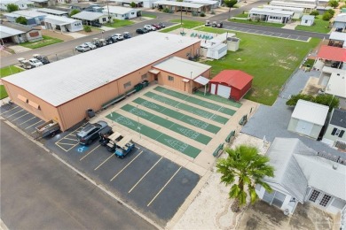 This 2-bedroom, 1.5-bath manufactured home is nestled in a on Howling Trails Golf  in Texas - for sale on GolfHomes.com, golf home, golf lot