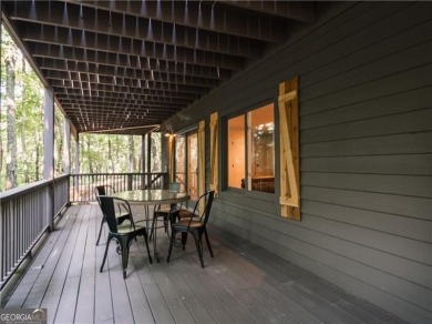 This charming Rustic Contemporary Cottage is located on a very on Big Canoe Golf Club - Cherokee in Georgia - for sale on GolfHomes.com, golf home, golf lot