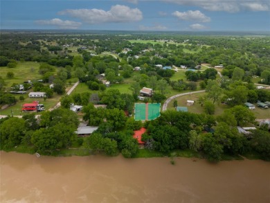 Situated near the beautiful Brazos River in Horseshoe Bend on Horseshoe Bend Country Club in Texas - for sale on GolfHomes.com, golf home, golf lot