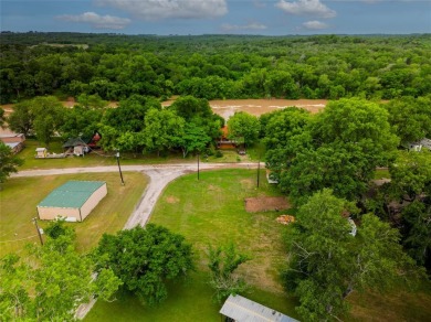 Situated near the beautiful Brazos River in Horseshoe Bend on Horseshoe Bend Country Club in Texas - for sale on GolfHomes.com, golf home, golf lot