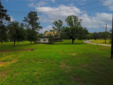 Situated near the beautiful Brazos River in Horseshoe Bend on Horseshoe Bend Country Club in Texas - for sale on GolfHomes.com, golf home, golf lot