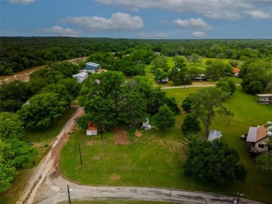 Situated near the beautiful Brazos River in Horseshoe Bend on Horseshoe Bend Country Club in Texas - for sale on GolfHomes.com, golf home, golf lot