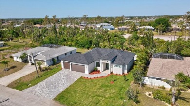 Your Dream Home Is Ready! Welcome to luxury coastal living in on Rotonda Golf and Country Club The Palms Course in Florida - for sale on GolfHomes.com, golf home, golf lot