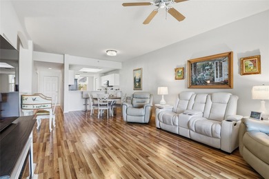 Elegant 1st-Floor Barrington Model with Serene Water & Golf on Heritage Oaks Golf and Country Club in Florida - for sale on GolfHomes.com, golf home, golf lot