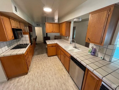 Spacious 3 bedroom home on Sundale Golf Course with two car on Sundale Country Club in California - for sale on GolfHomes.com, golf home, golf lot