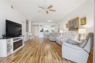 Elegant 1st-Floor Barrington Model with Serene Water & Golf on Heritage Oaks Golf and Country Club in Florida - for sale on GolfHomes.com, golf home, golf lot