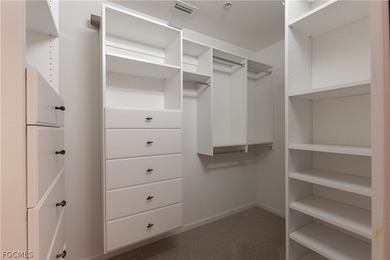 This first floor carriage home in Verandah is a blank canvas on Verandah Golf Course and Club in Florida - for sale on GolfHomes.com, golf home, golf lot