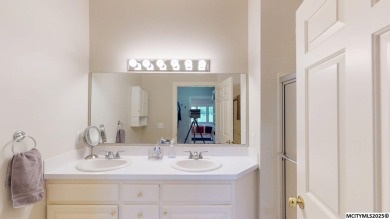 Wake up to stunning views of the Legacy Golf Course in this on Mason City Country Club in Iowa - for sale on GolfHomes.com, golf home, golf lot