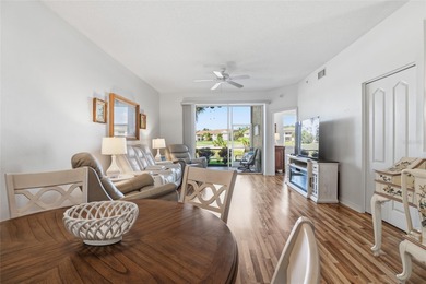 Elegant 1st-Floor Barrington Model with Serene Water & Golf on Heritage Oaks Golf and Country Club in Florida - for sale on GolfHomes.com, golf home, golf lot