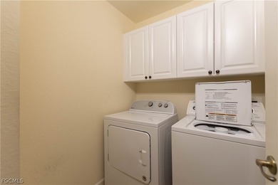 This first floor carriage home in Verandah is a blank canvas on Verandah Golf Course and Club in Florida - for sale on GolfHomes.com, golf home, golf lot