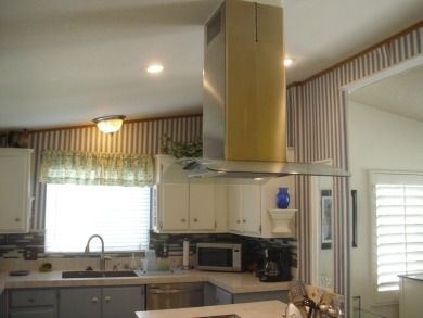 This well-maintained Triple wide manufactured home 3-bedroom 2 on Tri-Palm Estates Golf Club in California - for sale on GolfHomes.com, golf home, golf lot