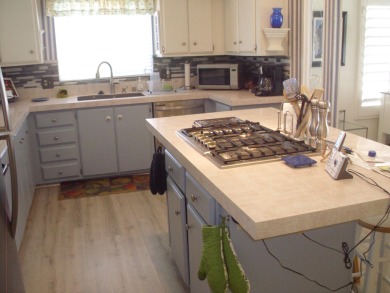 This well-maintained Triple wide manufactured home 3-bedroom 2 on Tri-Palm Estates Golf Club in California - for sale on GolfHomes.com, golf home, golf lot