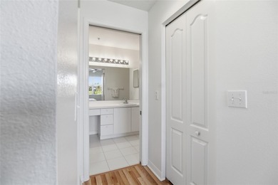 Elegant 1st-Floor Barrington Model with Serene Water & Golf on Heritage Oaks Golf and Country Club in Florida - for sale on GolfHomes.com, golf home, golf lot