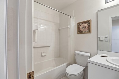 Elegant 1st-Floor Barrington Model with Serene Water & Golf on Heritage Oaks Golf and Country Club in Florida - for sale on GolfHomes.com, golf home, golf lot