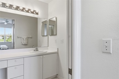 Elegant 1st-Floor Barrington Model with Serene Water & Golf on Heritage Oaks Golf and Country Club in Florida - for sale on GolfHomes.com, golf home, golf lot