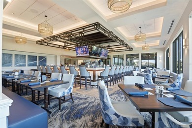 Elegant 1st-Floor Barrington Model with Serene Water & Golf on Heritage Oaks Golf and Country Club in Florida - for sale on GolfHomes.com, golf home, golf lot