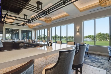 Elegant 1st-Floor Barrington Model with Serene Water & Golf on Heritage Oaks Golf and Country Club in Florida - for sale on GolfHomes.com, golf home, golf lot